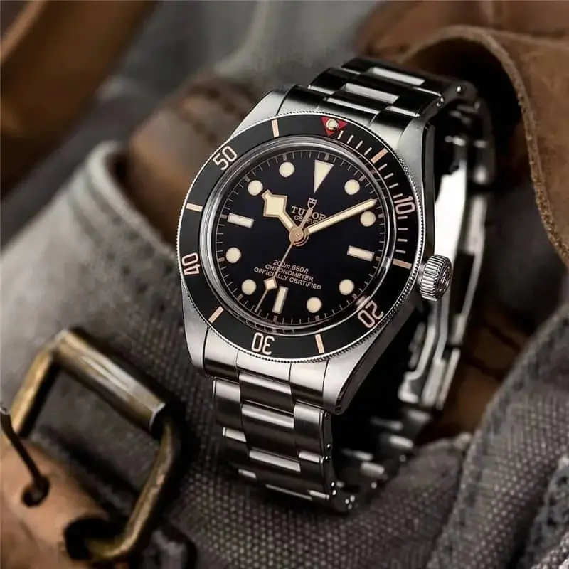 A Hublot rose gold chronograph watch with a deep blue dial and rubber strap, blending luxury and sporty elegance.